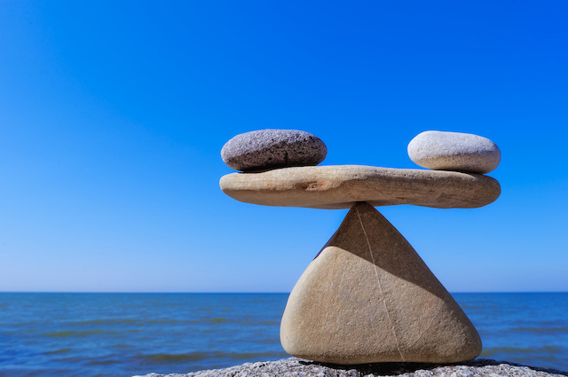 Balanced stones in equilibrium by the seaside